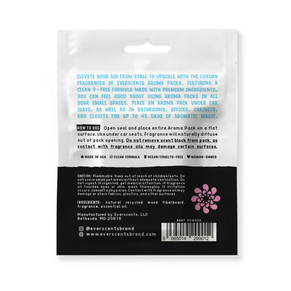 The back of the Everscents Aroma Pack pouch. The upper half is white, featuring an introductory product description printed in baby blue text and usage instructions printed in black text. The lower half is black with white text, containing product warnings, ingredient list, manufacturer information, brand website, a barcode, and the brand logo, shown isolated on a white background.