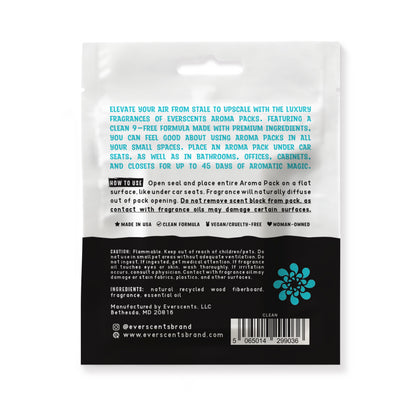 The back of the Everscents Aroma Pack pouch. The upper half is white, featuring an introductory product description printed in aqua blue text and usage instructions printed in black text. The lower half is black with white text, containing product warnings, ingredient list, manufacturer information, brand website, a barcode, and the brand logo, shown isolated on a white background.