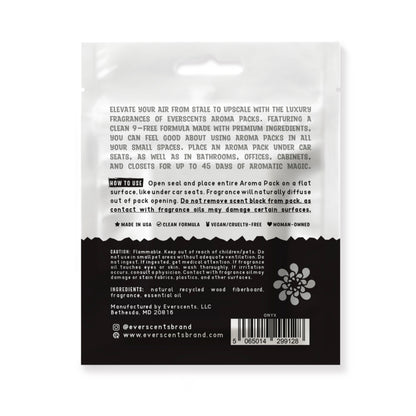 The back of the Everscents Aroma Pack pouch. The upper half is white, featuring an introductory product description printed in grey text and usage instructions printed in black text. The lower half is black with white text, containing product warnings, ingredient list, manufacturer information, brand website, a barcode, and the brand logo, shown isolated on a white background.
